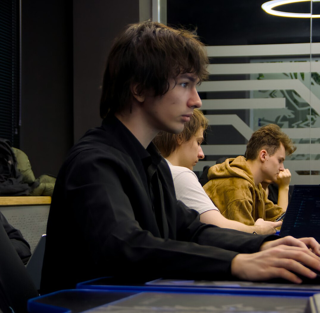 group of adults in coding class